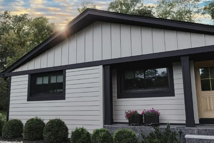 Modern farmhouse look using fiber-cement board-and-batten above horizontal lap with sleek black trim. Wildfire-wise, low maintenance, and Sierra-ready—premium siding installation for Placerville, Camino, and South Lake Tahoe homes.